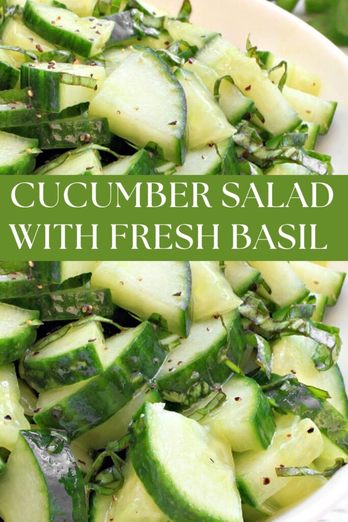 Bowl of cucumber salad with fresh basil ribbons and lemon dressing, served chilled.